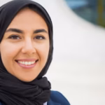 happy confident muslim business lady posing outside 74855 1966